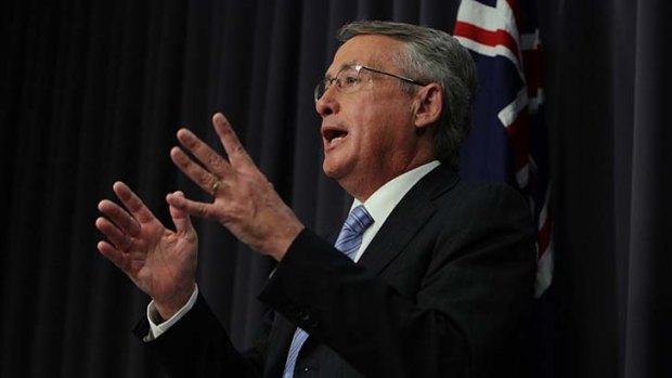Treasurer Wayne Swan is set to announce a $1 billion forecast surplus for this financial year.