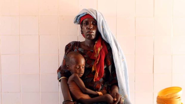 Just in time ... Mariama Awa and her malnourished son, Malla, travelled 160 kilometres for help.
