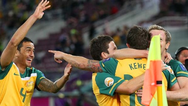 Harry Kewell of Australia celebrates his goal with Tim Cahill, Matt McKay and David Carney.