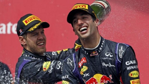 Ricciardo, right, has won three times this year, while Vettel has yet to top the podium.