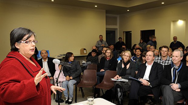 Greens MP Colleen Hartland speaks to Seddon and Footscray residents at the Regional Rail Link community meeting yesterday.