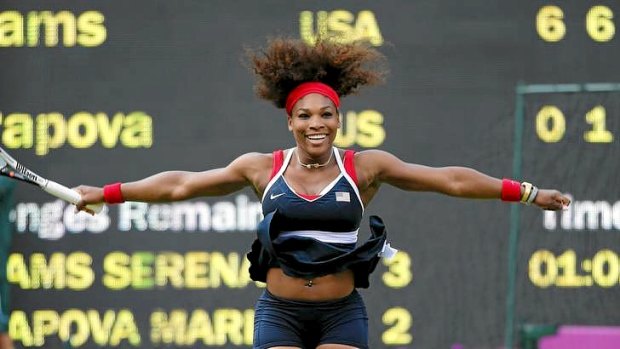 Serena Williams of the US celebrates after winning the women's singles gold medal match against Russia's Maria Sharapova at Wimbledon.