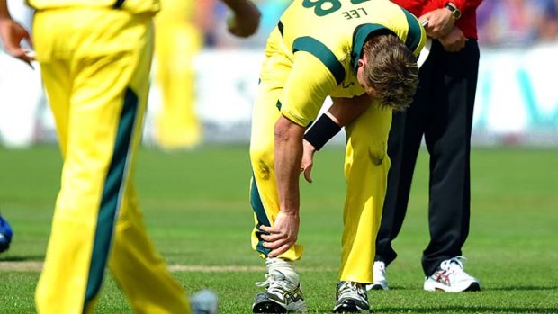 Hobbled ... Brett Lee is injured during the fourth One Day match against England.