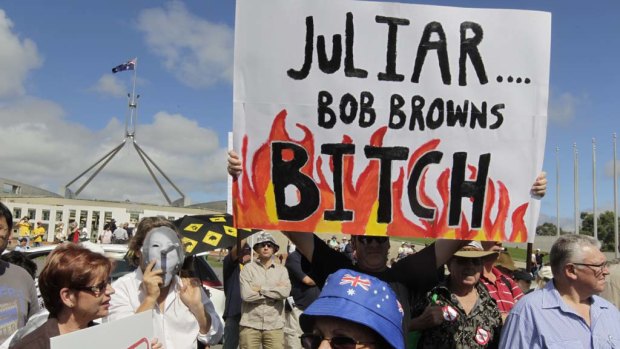 Protesters at the No Carbon Tax rally outside Parliament House in Canberra today.