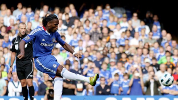 Didier Drogba scores his team's second goal from the penalty spot at Stamford Bridge.