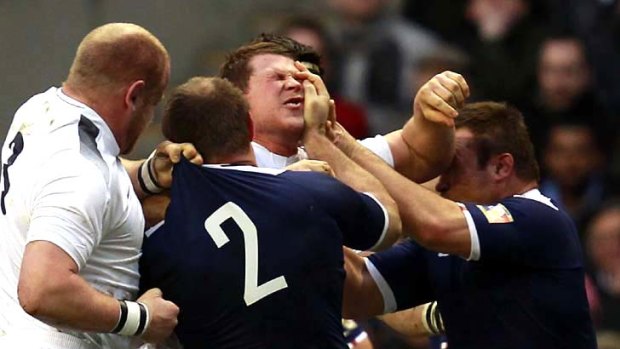 Tempers flare . . . Dan Cole and Dylan Hartley of England clash with their French front-row counterparts William Servat and Thomas Domingo.