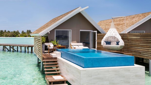 A water villa with pool.