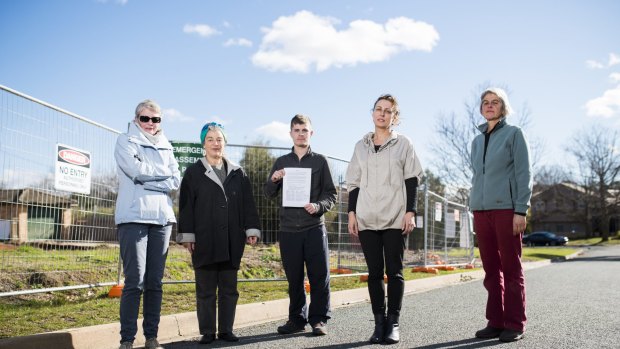 Hackett residents from left Shan Short, Tess Horwitz, Jack Taylor, Theresa Layton, and Bev Hogg, worried about the impact of townhouse development on the Fluffy blocks in their suburb.