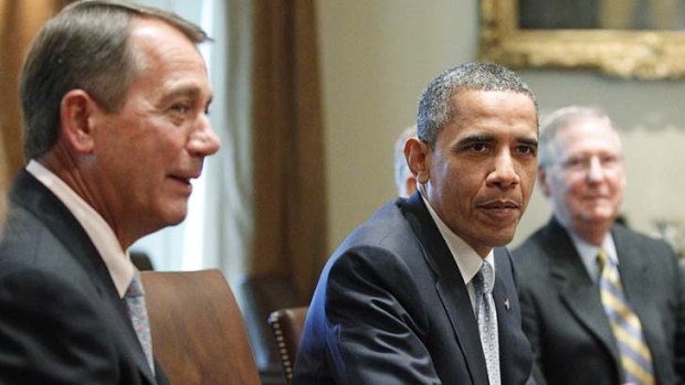 President Barack Obama sits with House Speaker John Boehner of Ohio.