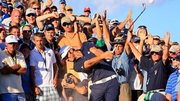 Sand blast . . . Dustin Johnson's hopes of winning the US PGA title were dashed after officials hit him with a two-stroke penalty for grounding his club in a bunker.