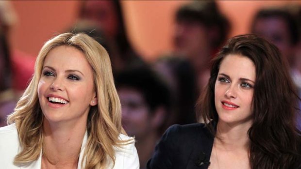South African actress Charlize Theron, left, and US actress Kristen Stewart.