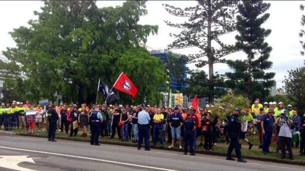 Anti-fascist protesters line Edmonstone Street in South Brisbane.