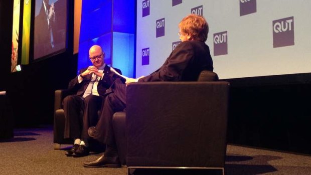 Former News Corporation Australia chief executive Kim Williams speaks with Kerry O'Brien at a QUT business leaders' function.