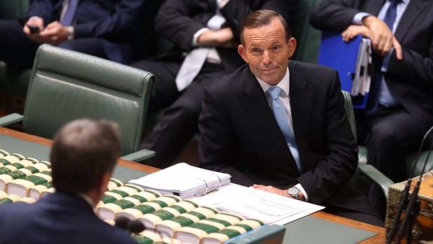 Prime Minister Tony Abbott faces a question from Opposition Leader Bill Shorten during question time.