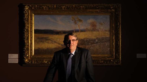 John Hindmarsh with Arthur Streeton's <i>Golden Harvest</i> at the National Gallery of Australia.