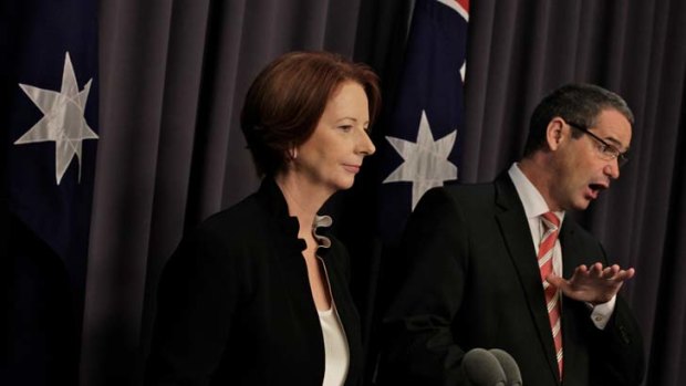 Um, put simply &#8230; Julia Gillard and the Communications Minister, Stephen Conroy, announce the rollout of the national broadband network in Canberra yesterday.