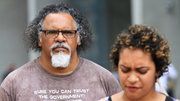 Wangan and Jagalingou traditional owner and council spokesperson Adrian Burragubba and his niece, Murrawah Johnson, speak outside the Brisbane Supreme Court in December after launching another challenge to the Adani Carmichael mine.