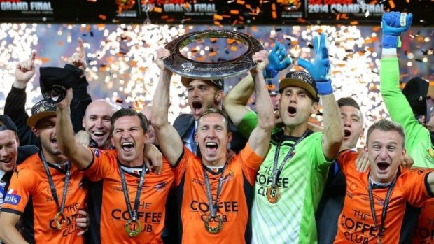 History: Brisbane Roar celebrate their unprecedented third A-League championship in four years.