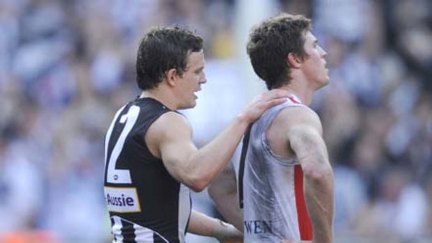 Luke Ball, formerly of St Kilda and now with Collingwood, consoles great mate Lenny Hayes after the final siren.