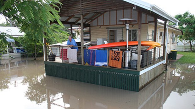 The floods surround the author's home this morning.