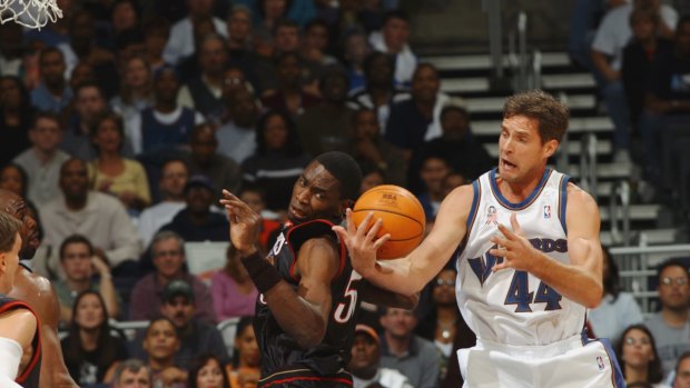 Lengthy career: Christian Laettner fights for the ball for the Washington Wizards against the Philadelphia 76ers in 2001.