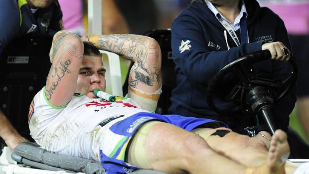 Raiders star Josh Dugan comes off the field after being injured against the Cowboys.