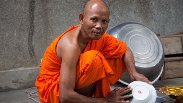 A monk at Phnom Sampeau.