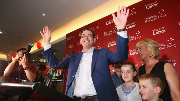 Labor Party leader Daniel Andrews, with his wife Catherine Andrews and family, celebrates the election victory.