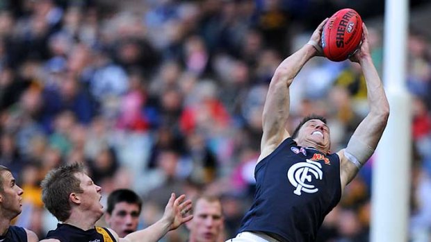 Carlton's Bret Thornton marks over Richmond's Jack Riewoldt at the MCG.