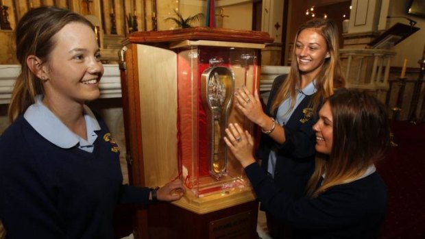 relic: The mummified forearm of St Francis Xavier on show at Sacred Heart Cathedral, Hamilton, in 2012. Picture shows students from St Francis Xavier