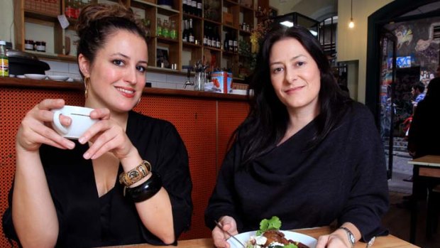 Danielle Draudt (left) and Michelle Matthews believe 'small and local' are the economics of happiness.
