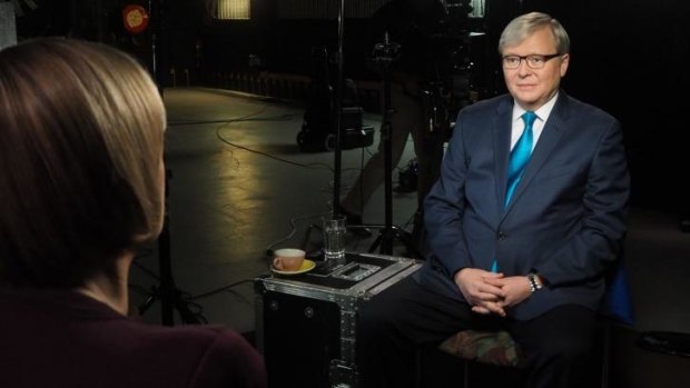 In the blue (tie) corner: Kevin Rudd listens to Sarah Ferguson. 