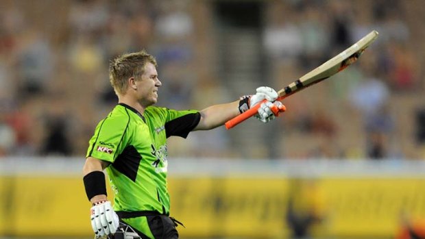 Oh yeah: David Warner celebrates his century in last night's win by the Sydney Thunder.