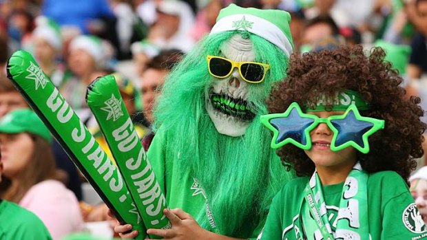 TV spectacle: Melbourne Stars' fans show their support during the Big Bash opener against the Melbourne Renegades.