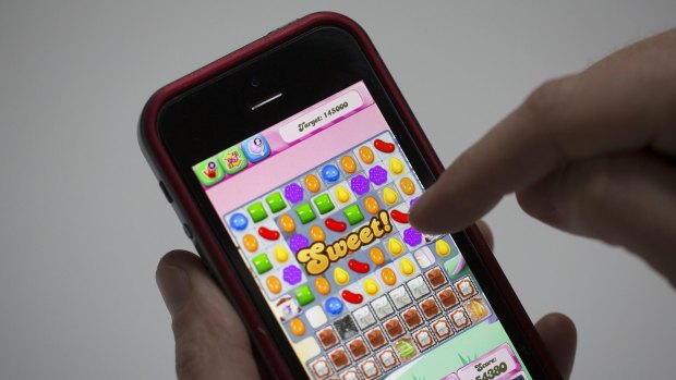 New levels or features in the Candy Crush game take up extra storage space.