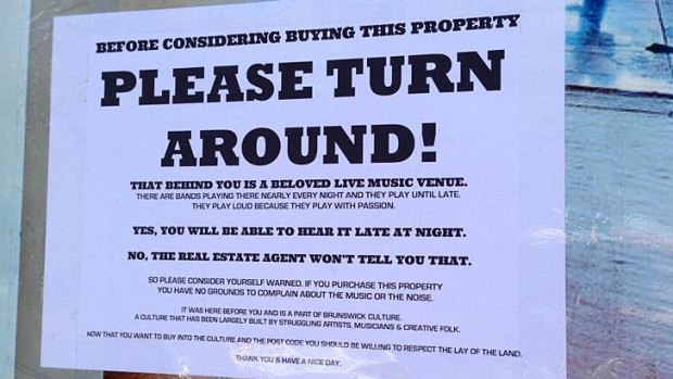A photograph, posted on Twitter by Marieke Hardy, of a notice taped to a 'for sale' sign on a house near the Retreat Hotel in Brunswick.