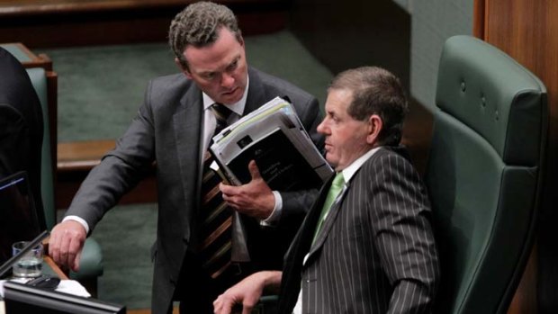Hard talk ... the manager of opposition business Christopher Pyne has a word to the new Speaker, Peter Slipper.