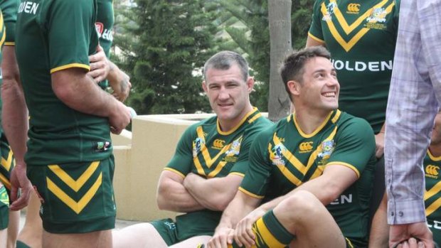 Bonding: Paul Gallen and Cooper Cronk at a team photo session on Monday.