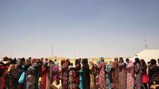 Women at the Khazair displacement camp. The fighting cross Iraq has internally displaced an estimated 1 million people. 