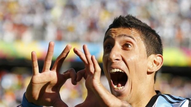 Angel Di Maria celebrates scoring against Switzerland during the World Cup.