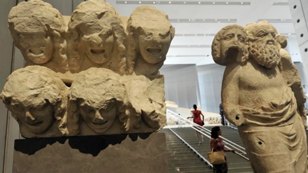 Statues are  displayed at the new Acropolis Museum during a media tour.