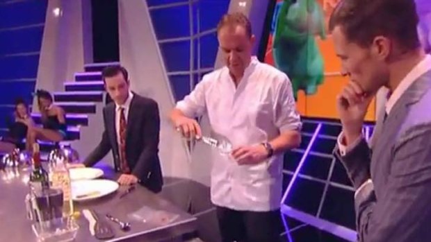 The presenters of Guinea Pig look on as their own flesh is fried up.