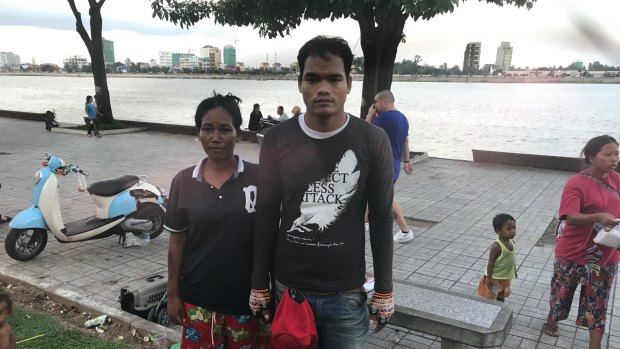 Yem Chanthy, on the Phnom Penh riverfront with her husband Both Chhork who takes food to James Ricketson in prison. They say his health is deteriorating.