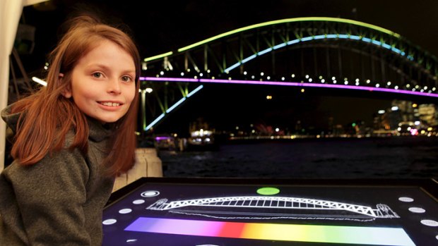 A glowing view ... The Sydney Harbour Bridge lit up for Vivid.