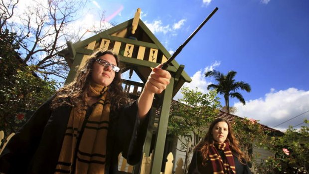 It's wizard: Organiser of Sydney Muggles United, Cassie Watson, left, and sister Alex.
