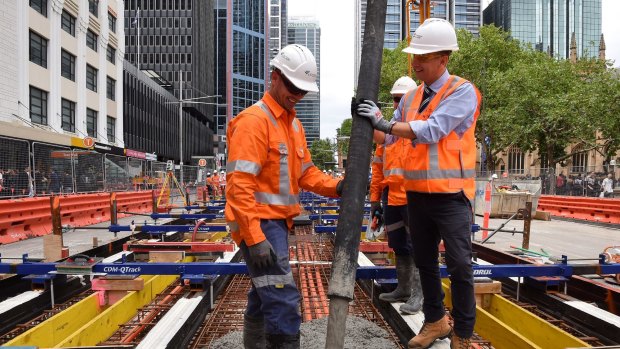 Transport minister Andrew Constance on George Street, as the first track is laid for a new light rail line.