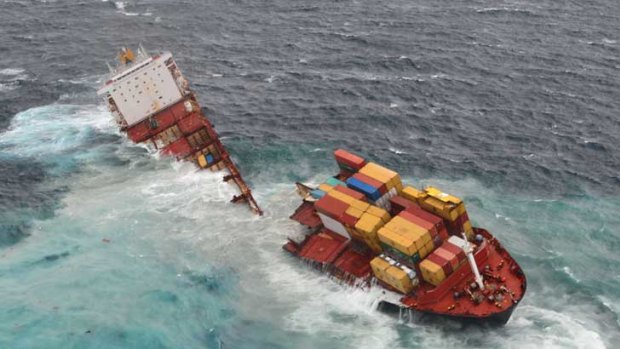 The container ship 'Rena' is split in two during a storm as it is pounded by high seas off the coast of Tauranga, New Zealand.