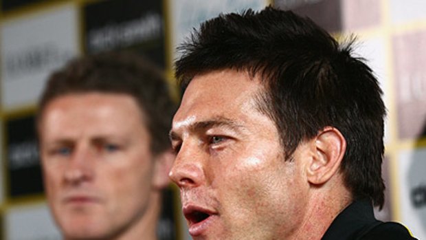 Ben Cousins is flanked by Richmond coach Damien Hardwick as he announces his retirement.