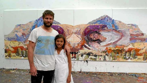 Ben Quilty and young actress Miah Madden with Quilty's painting for <i>The Darkside</i>.