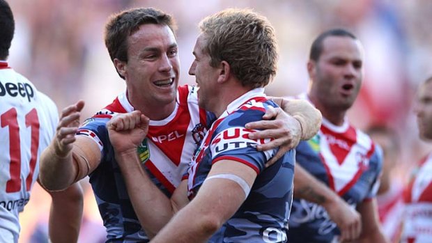 Anzac Day clash: Roosters celebrate a try.